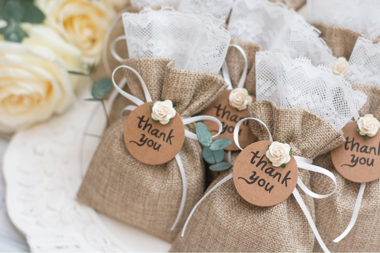 wedding favors - small cute bags with thank you note on front