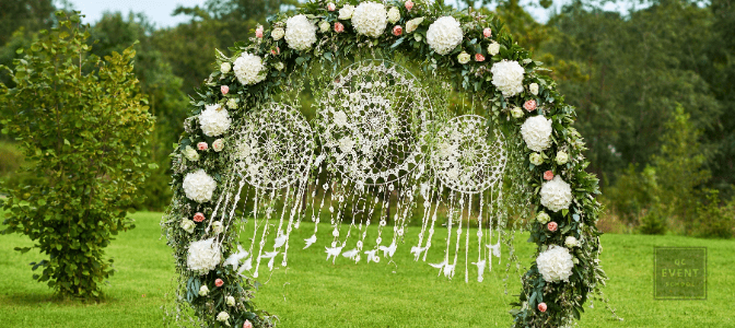 Wedding arch of flowers.Wedding ceremony.Festive Flower Arch.