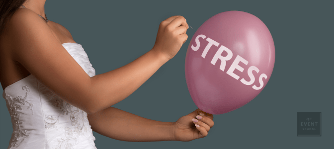 bride holding a pink balloon that says 'STRESS', and is about to pop it with a pin