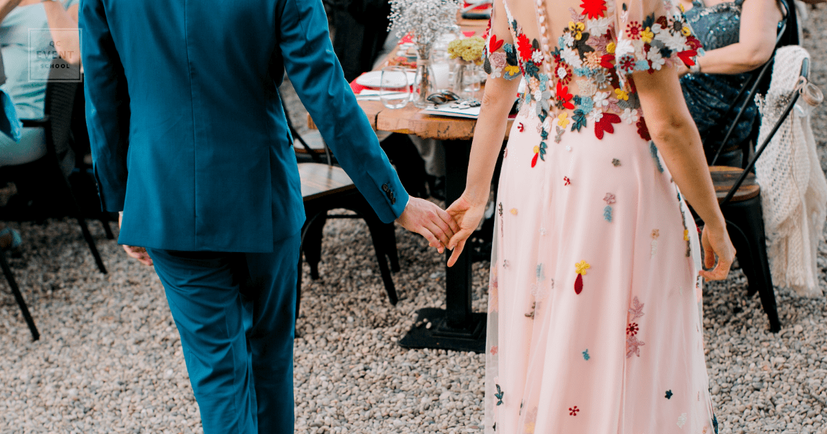 wedding business - bride and groom holding hands